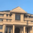 北京黄金麻别墅外墙干挂石材效果示例