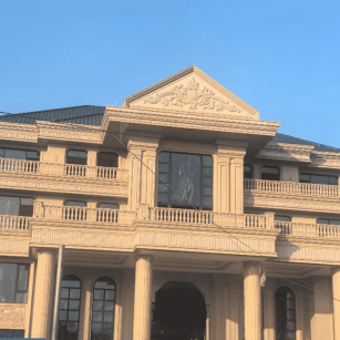 北京黄金麻别墅外墙干挂石材效果示例