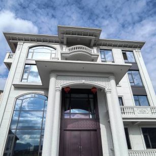 北京白麻别墅外墙干挂石材效果示例